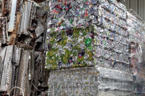 Bundled bales of cans in a recycling center